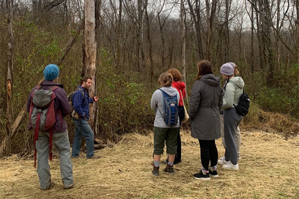 A group of students explore the outdoors.