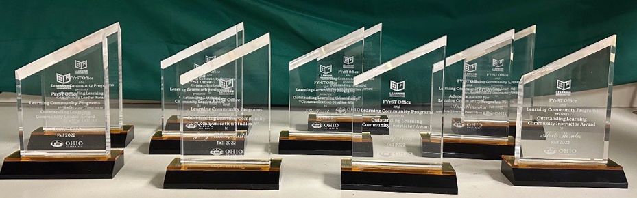 An image of Learning Community Awards on a table.