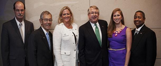Outstanding Federal Government Alumnus Kenneth J. Kies, shown here with his wife and daughter, celebrated his achievement with Voinovich School Director Mark Weinburg, U.S. Senator George V. Voinovich and Ohio University President Roderick J. McDavis.