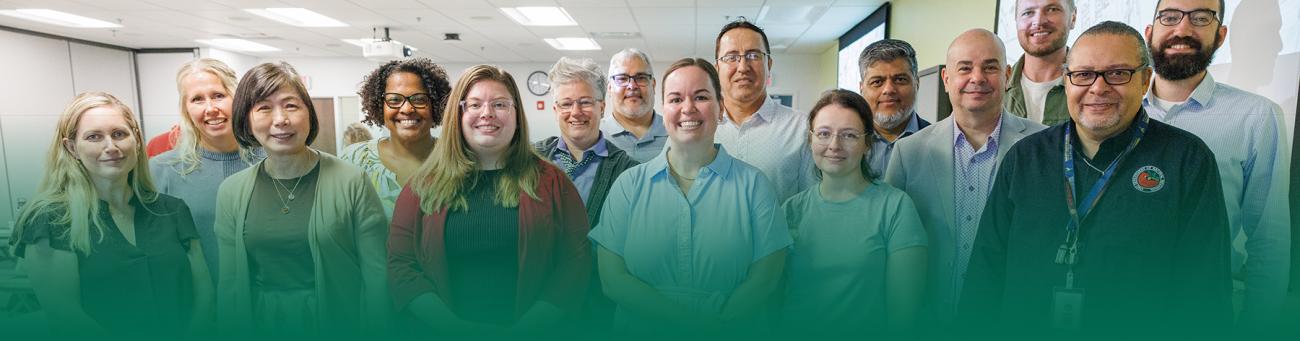 OCPM students standing together in a classroom
