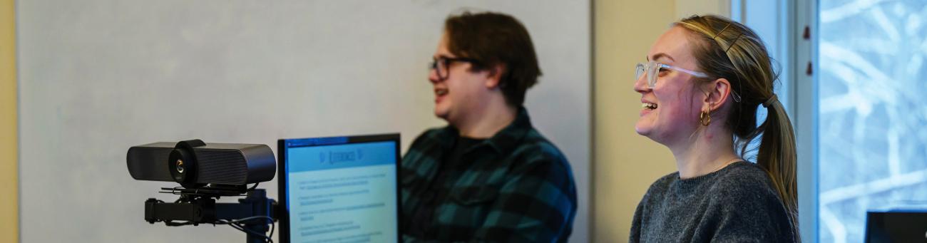 2 students presenting in a classroom 