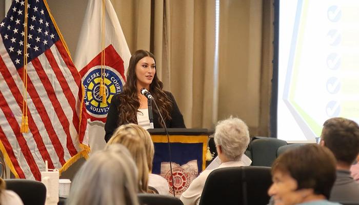 Ellen E. French, public administration leader and MPA graduate, presents at a government leadership event.
