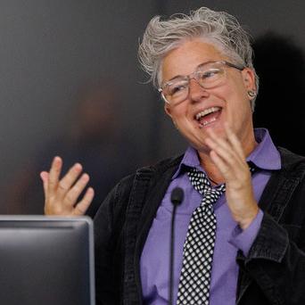 woman laughing in a classroom